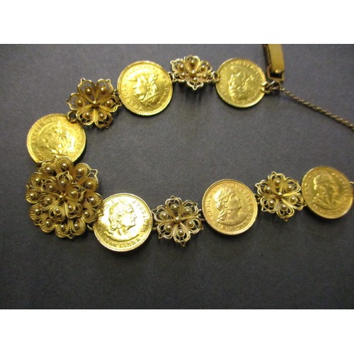 300 - A gold bracelet with filigree panels linking six Peruvian 1/5 Libra gold coins, approx. total weight... 