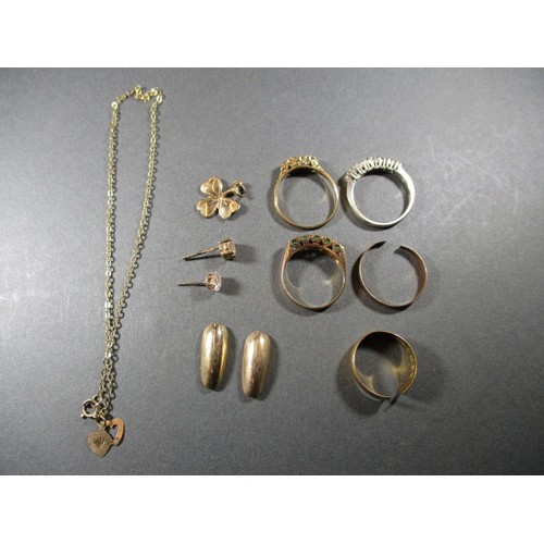 76 - A parcel of mixed carat gold and yellow metal items, to include 2, 14ct finger nail cover, 4, 9ct ri... 