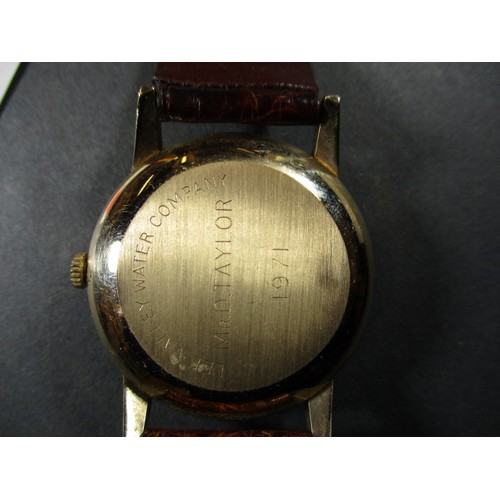 85 - A vintage 9ct gold cased gents automatic wristwatch from Garrards of London, in working order with o... 