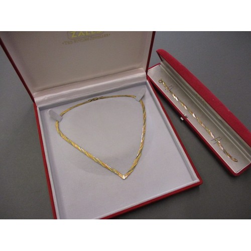 72 - A 1980’s 9ct tri-gold necklace and matching bracelet approx. weight 12.9g, both in original ZALES re... 