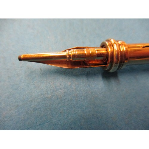 63 - An early 20th century 9ct gold propelling pen and pencil, approx. open length 12cm approx. weight 19... 