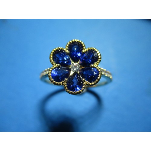 38 - An 18ct yellow gold, diamond and sapphire dress ring, approx. ring size O1/2, in good pre-owned cond... 