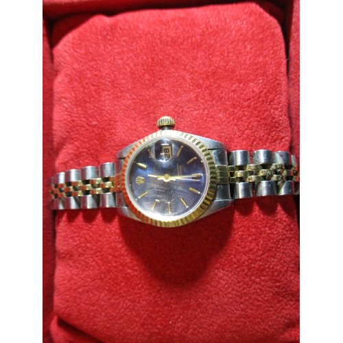 86 - A ladies Rolex Oyster perpetual datejust watch with original box and paperwork, in working order, Ca... 