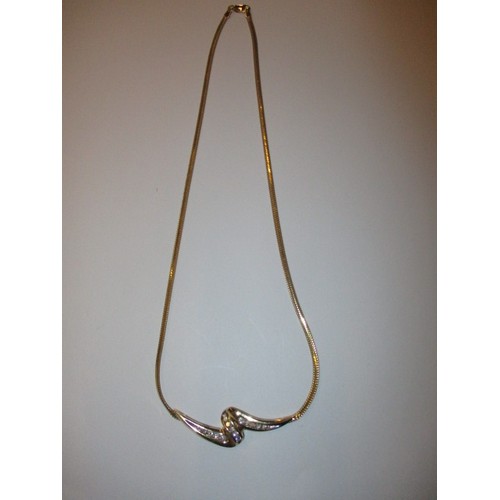 68 - A 14ct yellow gold and diamond necklace, in good condition with working clasp and general use relate... 