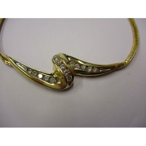 68 - A 14ct yellow gold and diamond necklace, in good condition with working clasp and general use relate... 