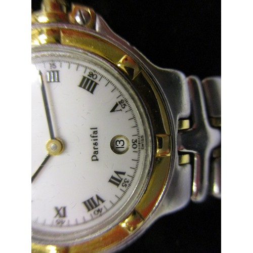 88 - A ladies Raymond Weil watch with yellow metal bezel and date window, in pre-owned condition and curr... 