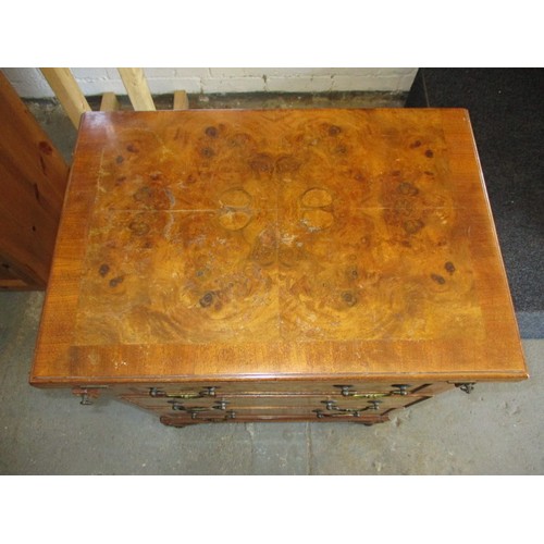 323 - A 20th century maple chest of 3 drawers with fold over table top resting on loapers, approx. dimensi... 