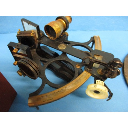 218 - A 1943 marine sextant by Henry Hughes & Son Ltd, in original fitted box, comes with several United S... 