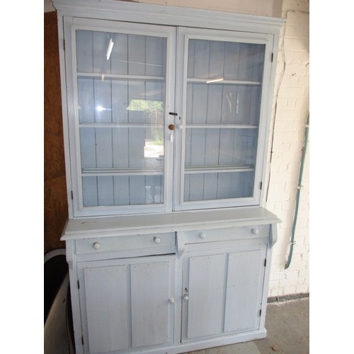 275 - An early 20th century painted pine kitchen dresser with glazed door top, having 2 cupboard base, in ... 