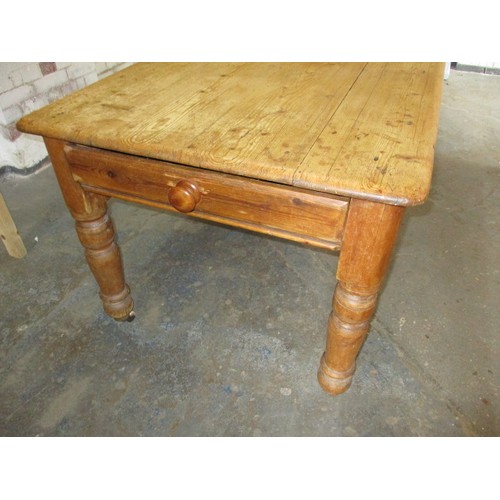 272 - An antique farm house pine kitchen table, with end drawer, approx. dimensions; H 73cm W85 cm L150 cm... 