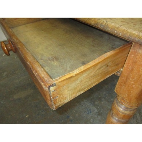 272 - An antique farm house pine kitchen table, with end drawer, approx. dimensions; H 73cm W85 cm L150 cm... 