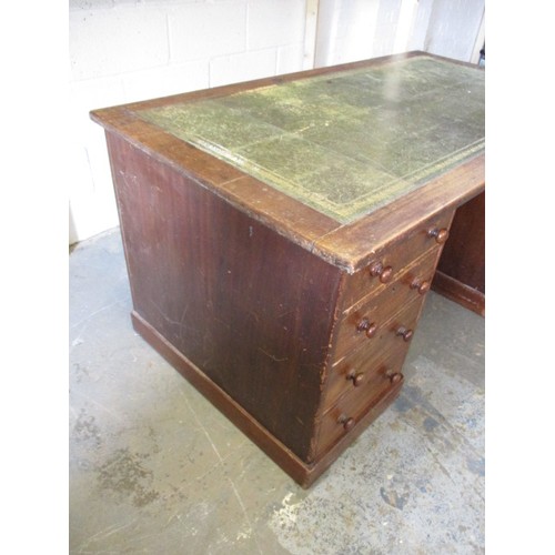 300 - An Edwardian office desk with leather inset writing surface and 2 columns of 4 drawers, the top remo... 