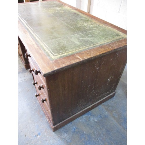 300 - An Edwardian office desk with leather inset writing surface and 2 columns of 4 drawers, the top remo... 