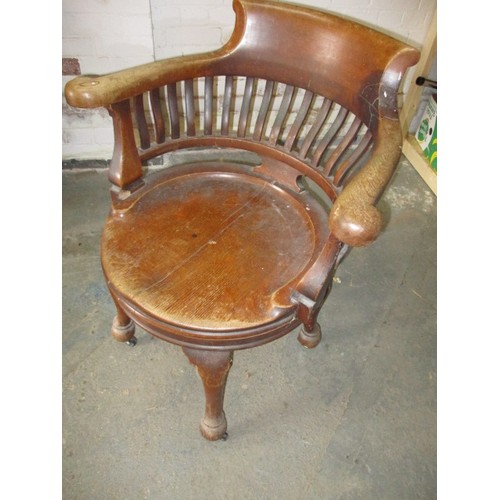 274 - An antique Captains/office swivel chair with later castors, approx. height 86cm, having had some age... 