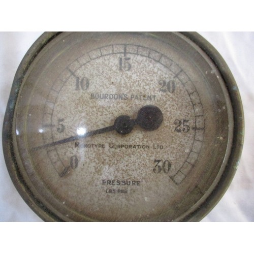 332 - 2 Brass pressure dials and a quantity of brass machine plaques, The large dial measures approx  18cm... 