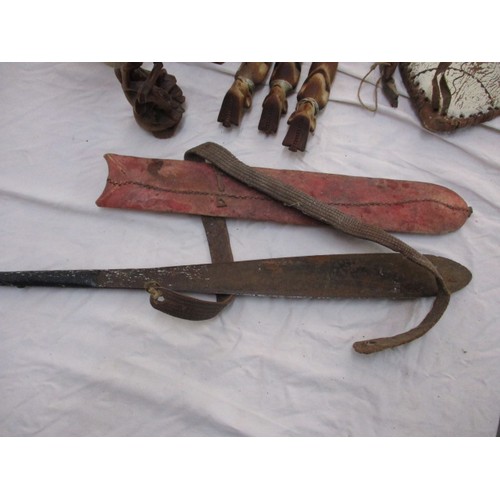 207 - A Collection of African tribal items to include a dagger and machete, all in reasonable condition wi... 