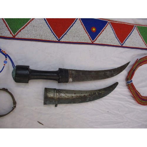 207 - A Collection of African tribal items to include a dagger and machete, all in reasonable condition wi... 