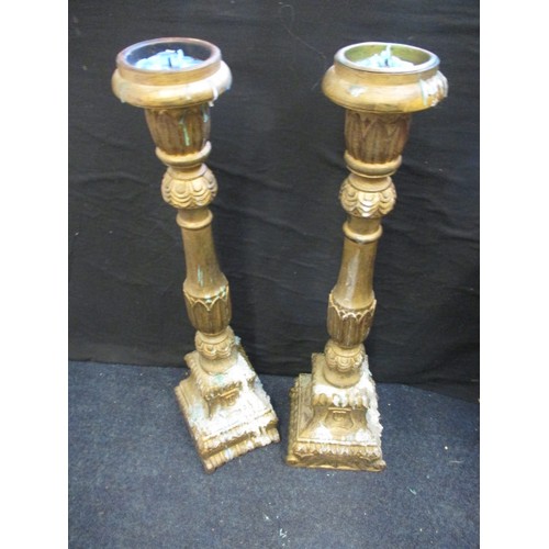 278 - 2 Large alter type candlesticks, approx. height 77cm, both in used condition with wax dribbles