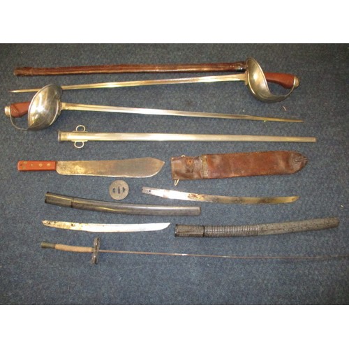 226 - A quantity of vintage blade weapons, to include a 1942 military machete and 2 Japanese Katana blades... 