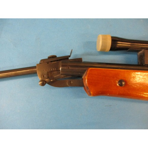 236 - A vintage Russian made air rifle, in good useable condition with and ASI 4x20 scope, approx. length ... 