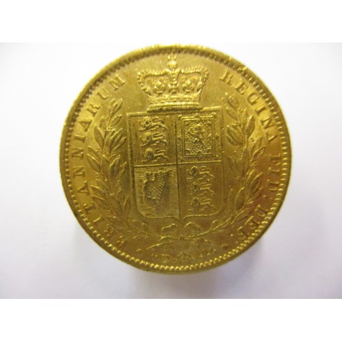 96 - A Victorian shield back full sovereign, dated 1855, a very good grade coin with general age-related ... 