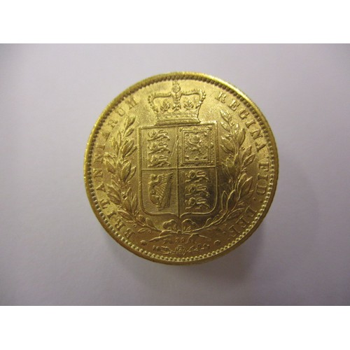 97 - A Victorian shield back full sovereign, dated 1869, a good grade coin with general age-related marks... 