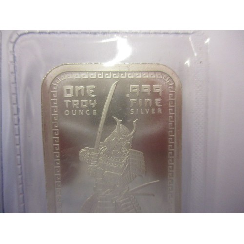 120 - Two one troy ounce .999 fine silver ingots, each depicting a samurai warrior and in sealed vacuum pa... 