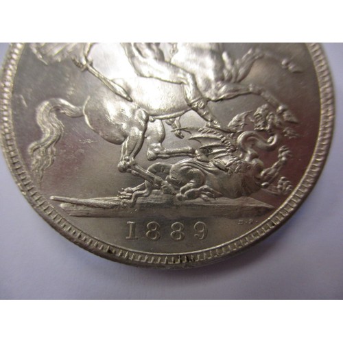 115 - 4 Pre-decimal silver coins, each in near uncirculated condition, to include an 1887 Crown an 1889 Cr... 