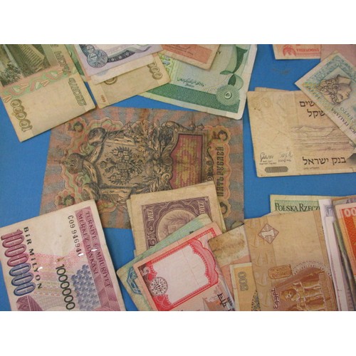 195 - A very large quantity of vintage circulated bank notes, of various countries and denominations