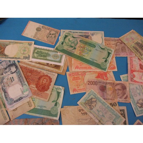 195 - A very large quantity of vintage circulated bank notes, of various countries and denominations