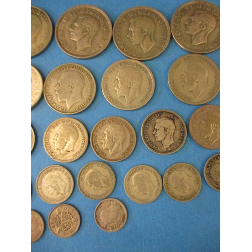 131 - A quantity of pre-decimal part silver coins to include a boxed World War II numismatic set with pape... 