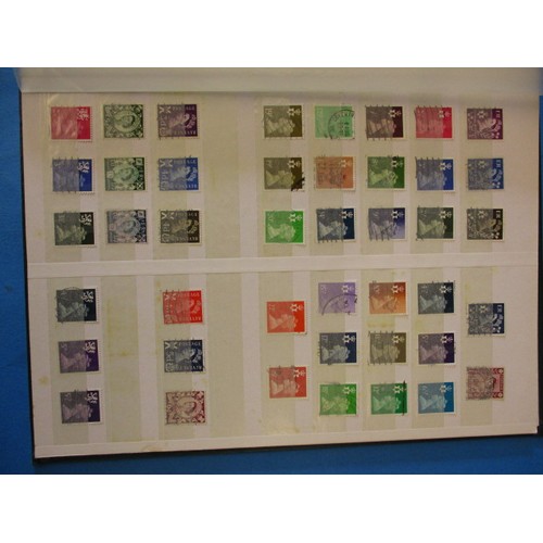 334 - An album of pre-decimal and later British stamps, most with posted cancellation marks