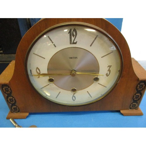 290 - An early 20th century slate mantle clock and a mid-century example by Smiths, neither tested to see ... 