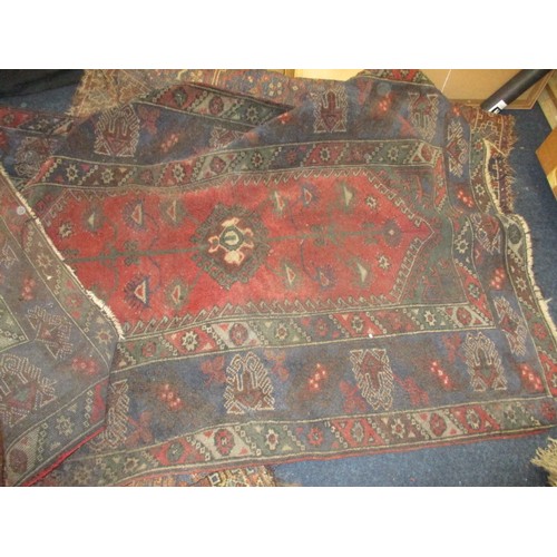 363 - 4 vintage Persian hand woven wool rugs, all in well used condition with some fraying and stains, and... 