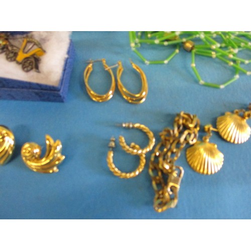 166 - A parcel of vintage costume jewellery to include a pair of 9ct gold cufflinks, approx. gold weight 7... 