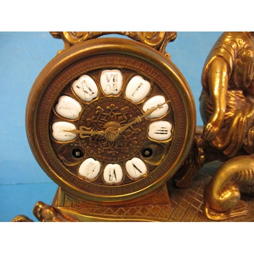 292 - A vintage continental gilt metal clock, striking on a bell, no key so not tested for function, appro... 