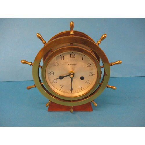 289 - A brass ships wheel clock, having had the movement converted to battery, approx. height 22cm