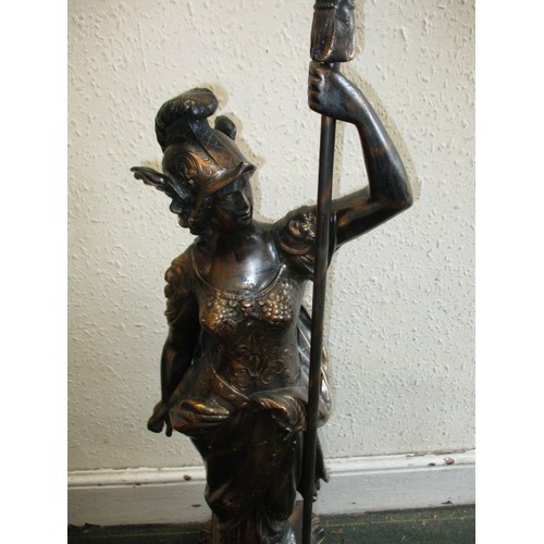 324 - A large patinated metal sculpture of female warrior, approx. height 122cm, in good condition with no... 