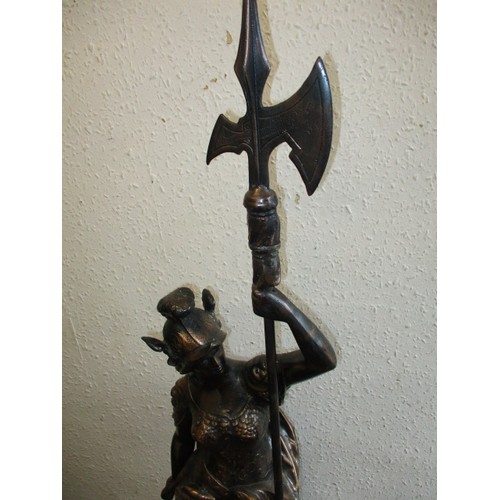 324 - A large patinated metal sculpture of female warrior, approx. height 122cm, in good condition with no... 