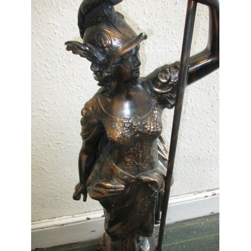 324 - A large patinated metal sculpture of female warrior, approx. height 122cm, in good condition with no... 