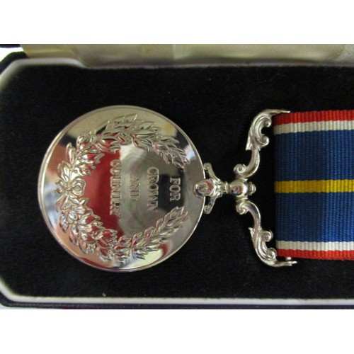 213 - A National service medal, in original box and in un-used condition with card, number 16440