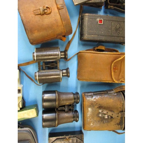 354 - A quantity of vintage cameras and binoculars, various models, all in pre-owned condition with genera... 