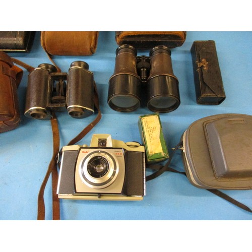 354 - A quantity of vintage cameras and binoculars, various models, all in pre-owned condition with genera... 