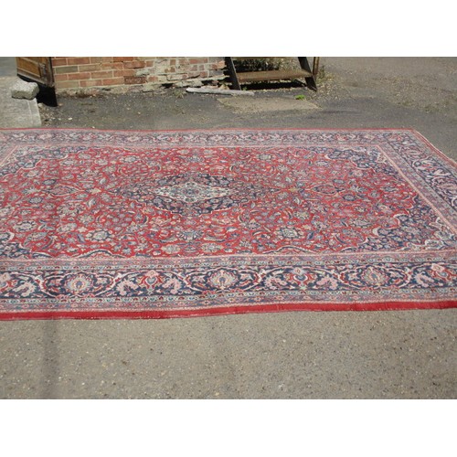 364 - A large Persian style machine made wool rug, approx. size 373cm x 271cm