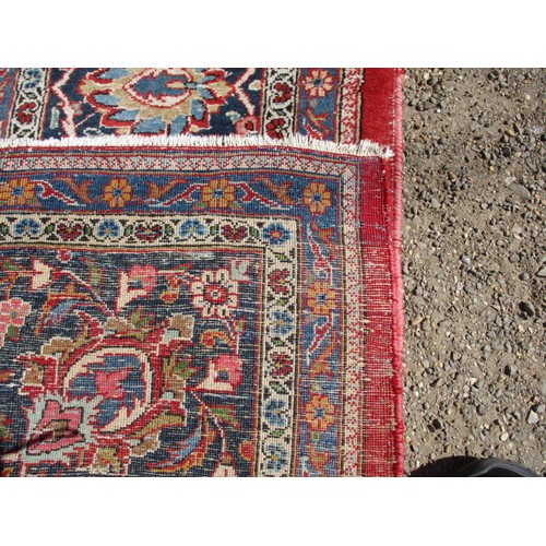 364 - A large Persian style machine made wool rug, approx. size 373cm x 271cm