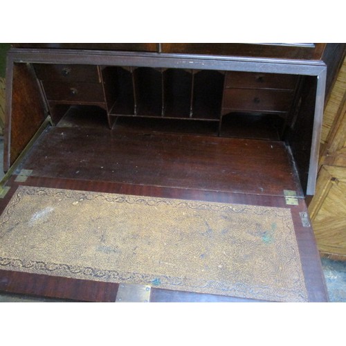 298 - An antique bureau bookcase, having various compartments and glazed top cabinet. Comes in two part fo... 