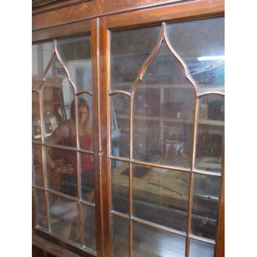 298 - An antique bureau bookcase, having various compartments and glazed top cabinet. Comes in two part fo... 