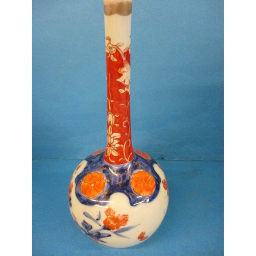 252 - A Japanese porcelain jar with cover, approx. height 37cm and an oriental bud vase and another covere... 