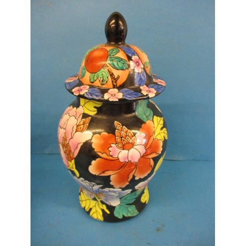 252 - A Japanese porcelain jar with cover, approx. height 37cm and an oriental bud vase and another covere... 