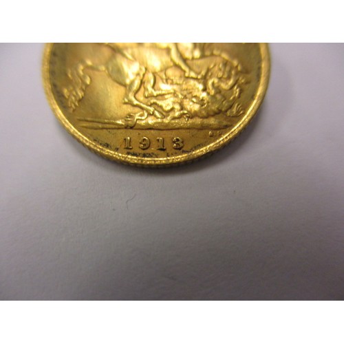 75 - A George V gold half sovereign, dated 1913, a good grade coin